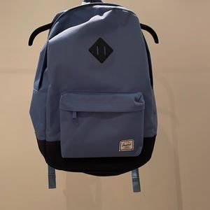 Hershel, light blue and navy, standard sz back pack. Used for one school year.